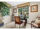 Home office with window, desk, and comfortable seating at 12843 Madison Pointe Cir # 107, Orlando, FL 32821