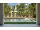 Inviting rectangular pool with a bamboo privacy screen at 1781 Goodrich Ave, Winter Park, FL 32789