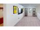 Spacious bonus room with TV, shelving, and closet at 2277 Derwent Dr, Davenport, FL 33896