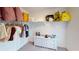 closet with shelving, clothing, and toys at 2277 Derwent Dr, Davenport, FL 33896