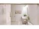 Clean bathroom with a vanity, toilet, and shower at 2277 Derwent Dr, Davenport, FL 33896