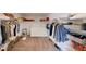 Spacious walk-in closet with ample shelving and hanging space at 2277 Derwent Dr, Davenport, FL 33896