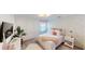 Charming bedroom with floral wallpaper and a comfy bed at 2277 Derwent Dr, Davenport, FL 33896