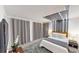 Modern bedroom with gray accents and a plush rug at 2277 Derwent Dr, Davenport, FL 33896