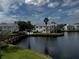 Community with lakefront access and walking bridge at 2520 Woodgate Blvd # 202, Orlando, FL 32822