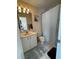 Clean bathroom with shower/tub combo and vanity at 2520 Woodgate Blvd # 202, Orlando, FL 32822