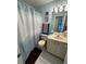 Clean bathroom with shower/tub combo and vanity at 2520 Woodgate Blvd # 202, Orlando, FL 32822