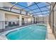 Refreshing pool with spa and screened enclosure at 3032 Mahalo Dr, Davenport, FL 33897