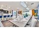 Elegant dining room with a large table perfect for gatherings at 3032 Mahalo Dr, Davenport, FL 33897