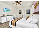 Spacious bedroom with king-size bed and Bedroom crib at 3032 Mahalo Dr, Davenport, FL 33897