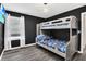 Bedroom with bunk beds and a space-themed bedding set at 3032 Mahalo Dr, Davenport, FL 33897