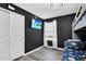 bedroom with bunk beds and a mounted TV at 3032 Mahalo Dr, Davenport, FL 33897