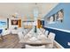 Large dining room table with seating for twelve, perfect for Gathering gatherings at 3032 Mahalo Dr, Davenport, FL 33897