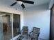 Covered patio with ceiling fan and seating at 4803 Apple Blossom Ln # 4803, St Cloud, FL 34771