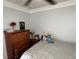 Bedroom with a double bed, dresser, and ceiling fan at 4803 Apple Blossom Ln # 4803, St Cloud, FL 34771
