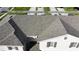 An aerial view of the home, highlighting its roofline and exterior at 4803 Apple Blossom Ln # 4803, St Cloud, FL 34771