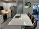 Modern kitchen with stainless steel appliances and a large island at 4803 Apple Blossom Ln # 4803, St Cloud, FL 34771