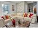 Bright living room with a sectional sofa and decorative pillows at 4803 Apple Blossom Ln # 4803, St Cloud, FL 34771