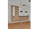 Modern kitchen with white cabinets, mosaic backsplash, and granite countertops at 6214 Stevenson Dr # 303, Orlando, FL 32835