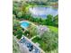 Resort-style pool and clubhouse near a tranquil lake at 6214 Stevenson Dr # 303, Orlando, FL 32835