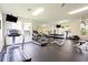 Well-equipped fitness center with various cardio and weight training machines at 6214 Stevenson Dr # 303, Orlando, FL 32835