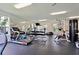 Well-equipped fitness center with various cardio and weight training machines at 6214 Stevenson Dr # 303, Orlando, FL 32835