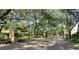 Community entrance with gated access and lush landscaping at 6214 Stevenson Dr # 303, Orlando, FL 32835