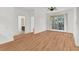 Spacious bedroom with hardwood floors and access to balcony at 6214 Stevenson Dr # 303, Orlando, FL 32835