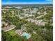 Community overview showcasing homes, landscape, and pool at 6214 Stevenson Dr # 303, Orlando, FL 32835