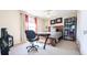 Bedroom with a double bed, desk and chair, and a bookcase at 1065 S Hiawassee Rd # 1428, Orlando, FL 32835