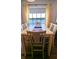 Bright dining room with lake view at 1065 S Hiawassee Rd # 1428, Orlando, FL 32835