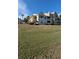 Condo building on a grassy hill overlooking a lake at 1065 S Hiawassee Rd # 1428, Orlando, FL 32835
