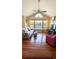 Spacious living room boasts hardwood floors and stunning lake views at 1065 S Hiawassee Rd # 1428, Orlando, FL 32835