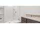 Bathroom with shower, toilet and granite countertop at 1209 Limbali St, Mount Dora, FL 32757