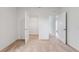 Bedroom with carpet, double door closets, and access to hallway at 1209 Limbali St, Mount Dora, FL 32757