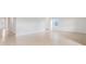 Bright and airy living room with tile flooring and access to other rooms at 1209 Limbali St, Mount Dora, FL 32757