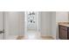 Hallway with access to bathroom and bedroom at 1209 Limbali St, Mount Dora, FL 32757