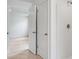 Bathroom with shower, double doors, and access to bedroom at 1209 Limbali St, Mount Dora, FL 32757