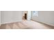Bright bedroom with neutral carpet and view of bathroom at 1209 Limbali St, Mount Dora, FL 32757