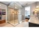 Spa-like bathroom with large glass shower and double vanity at 1429 Chapman Cir, Winter Park, FL 32789