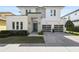 Modern two-story house with stone accents at 1429 Chapman Cir, Winter Park, FL 32789
