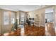 Upstairs office area with built-in shelving and hardwood floors at 1429 Chapman Cir, Winter Park, FL 32789