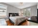 Spacious bedroom with hardwood floors, plantation shutters, and neutral decor at 1429 Chapman Cir, Winter Park, FL 32789