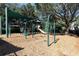 playground with swings and play structures at 1429 Chapman Cir, Winter Park, FL 32789