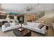 Bright living room with white sofas and large windows at 1429 Chapman Cir, Winter Park, FL 32789