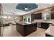 Modern kitchen island with granite countertop and dark cabinetry at 1429 Chapman Cir, Winter Park, FL 32789