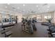 Modern fitness center with a variety of cardio and strength training equipment at 1653 Three Bars Rd, Kissimmee, FL 34744