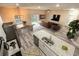 Open floor plan kitchen and dining area with modern finishes at 2642 Magnolia Cir, Lake Wales, FL 33898
