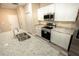 Modern kitchen featuring stainless steel appliances and granite countertops at 2642 Magnolia Cir, Lake Wales, FL 33898