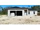 Newly constructed single-story home with a gray roof and block exterior at 2642 Magnolia Cir, Lake Wales, FL 33898